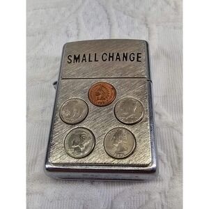 un used Vintage 2003 Small Change Coins Emblem Zippo Lighter Not Copper